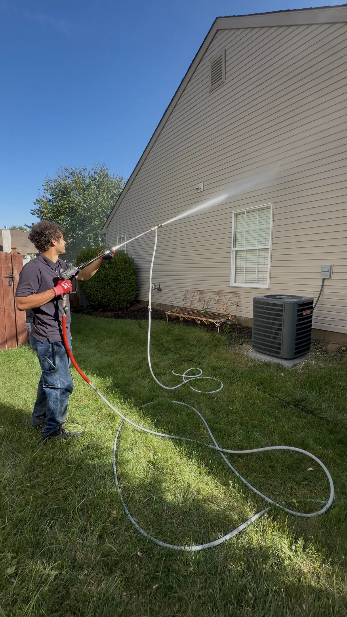 Lakeline Exteriors soft washing a home in Fishers, IN